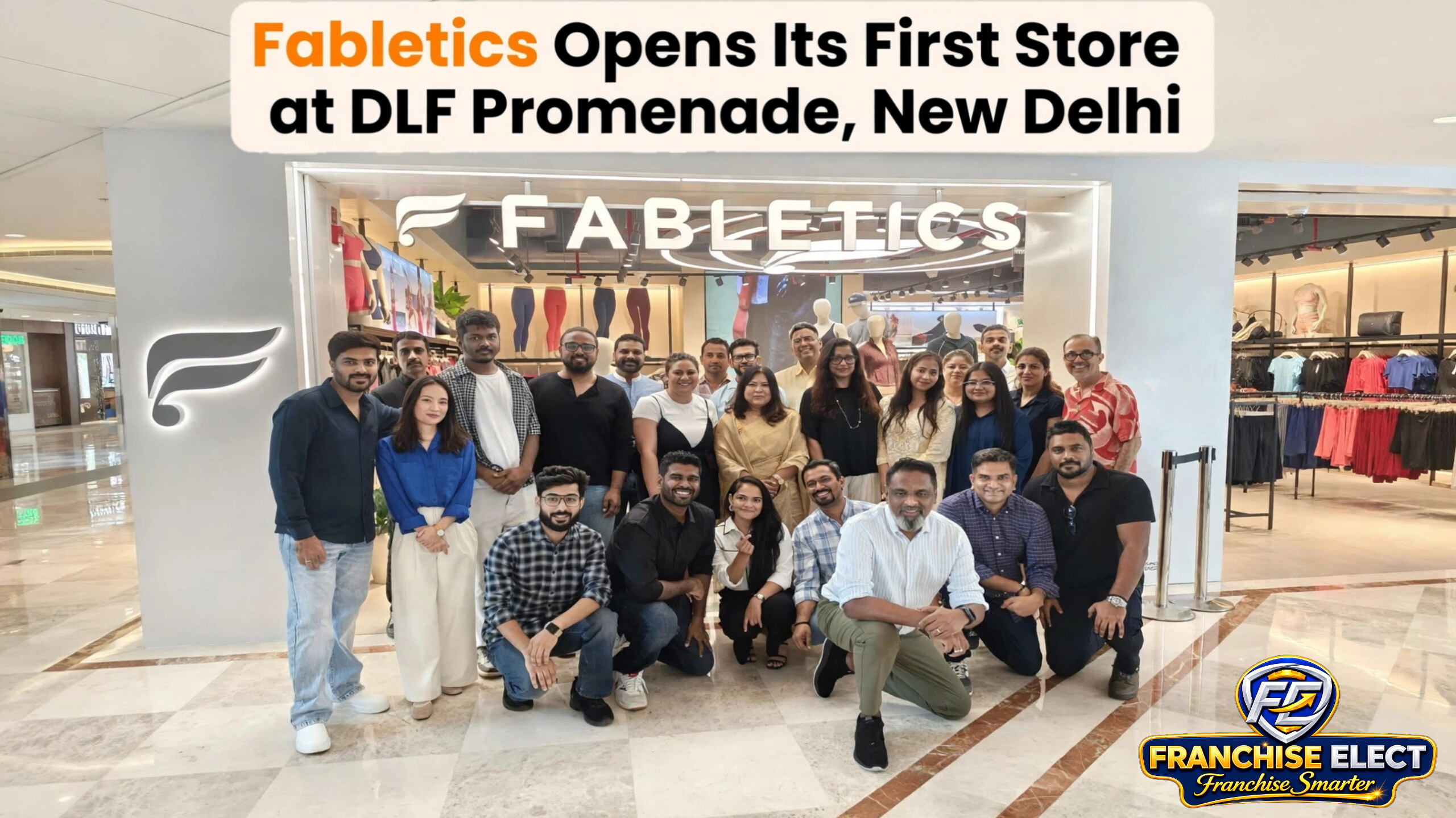 Team of Fabletics and Reliance Brands staff posing in front of Fabletics first store at DLF Promenade, New Delhi, marking the brand's official entry into India