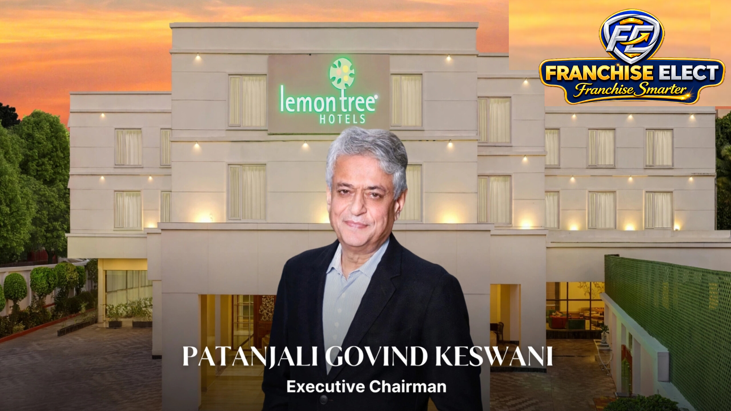 Patanjali Govind Keswani, Executive Chairman of Lemon Tree Hotels, standing in front of Lemon Tree Hotels building during sunset. Lemon Tree is preparing to separate hotel ownership from management and franchising. Fleur Hotels plans to deploy about 1 billion dollars over four to five years according to Mint October 4 report`