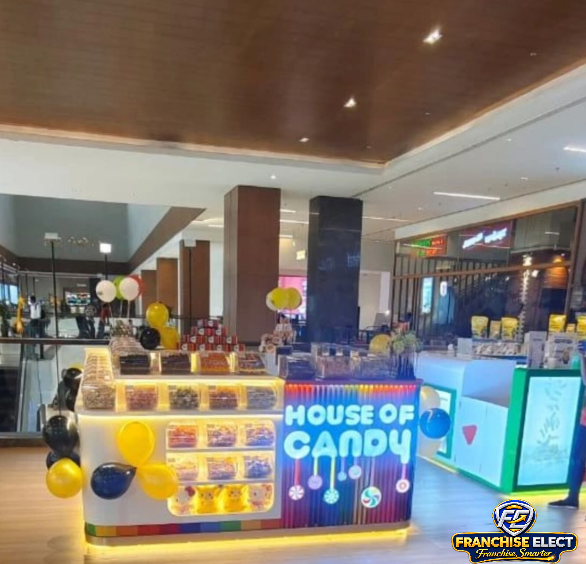 House of Candy new outlet kiosk at JW Marriott Pune with colorful candy display and balloons, confectionery retailer expands to over 300 outlets across India - Image Courtesy: House of Candy`
