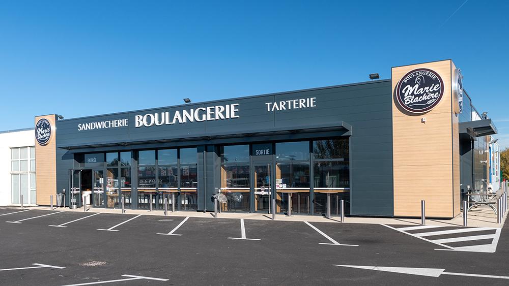 Marie Blachère bakery store in France featuring its boulangerie, sandwich shop and tart shop, illustrating the French bakery chain's UK franchise expansion plans.